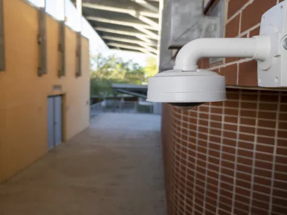 Exterior wall of school with camera in foreground