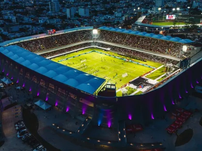 Evening aerial view of football match played at Luis Pirata Fuente Stadium