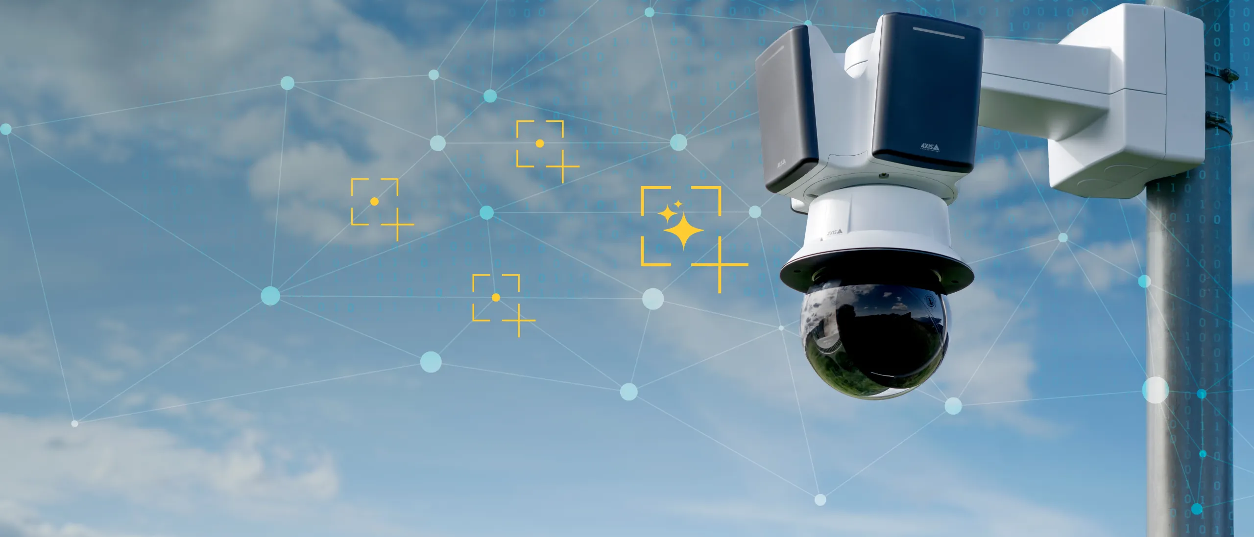 Axis network camera mounted on a pole outside with a blue sky in the background.