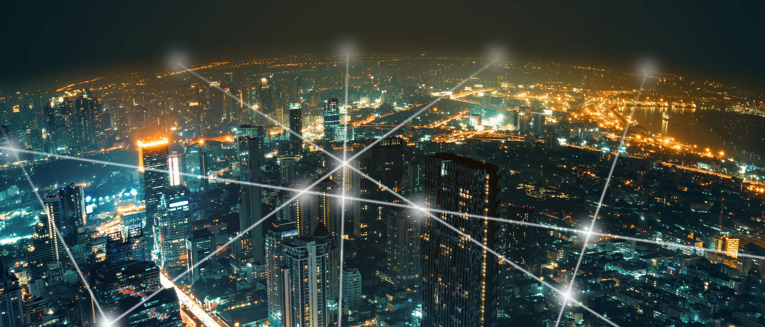 light dots in the sky and view of the city buildings. 