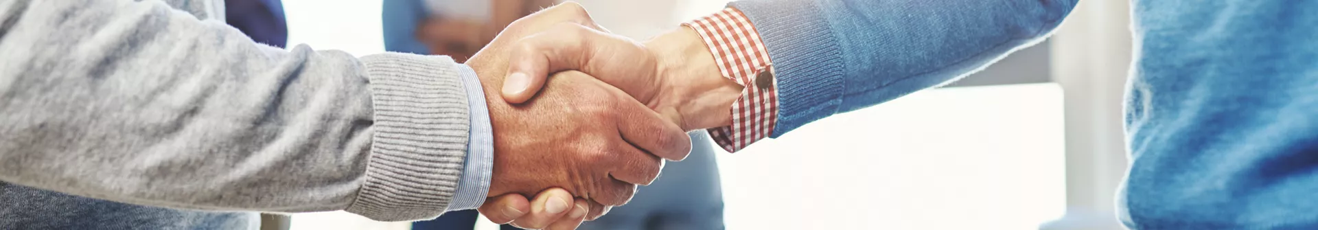 two people shaking hands