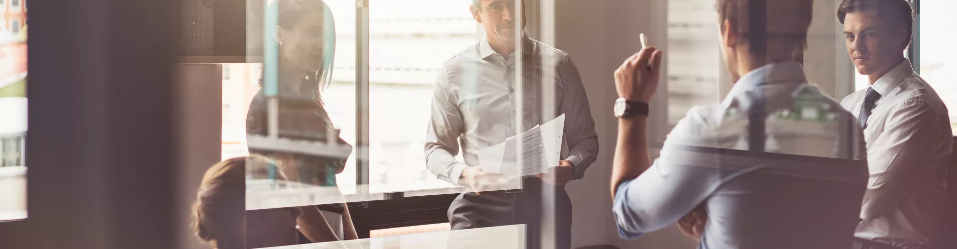 Meeting room with people talking