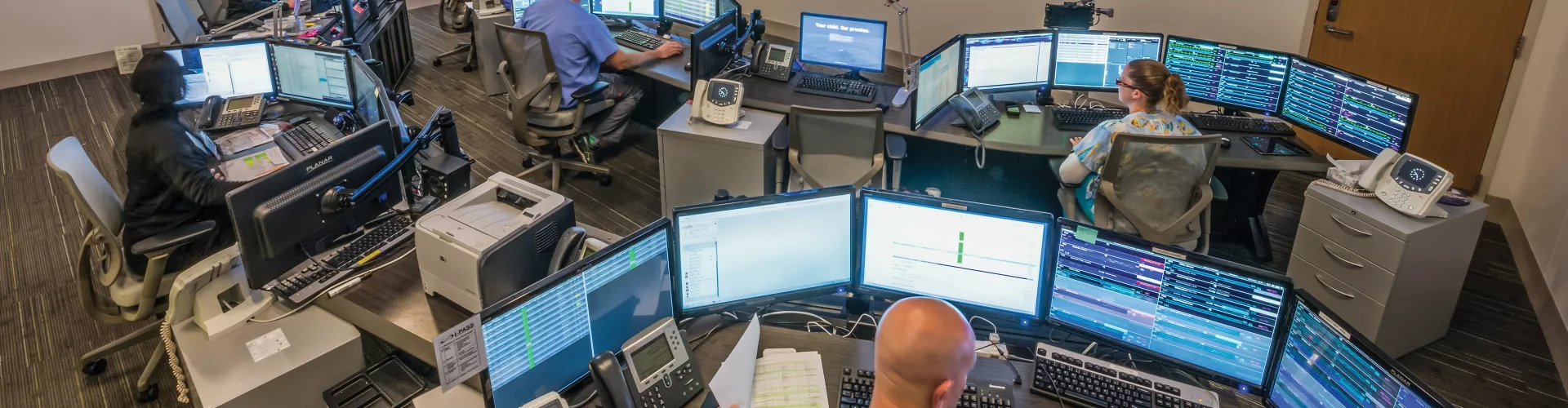 Hospital monitor room with several screens