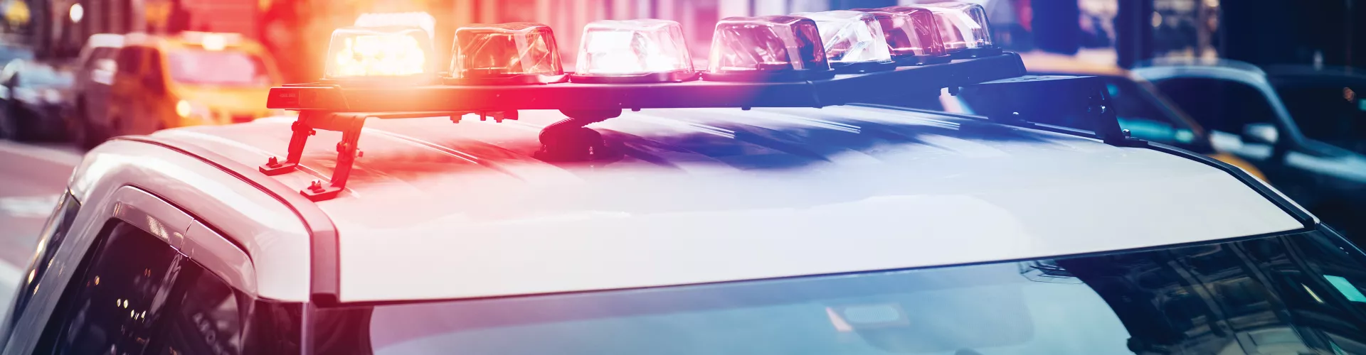 Police car with blue and red ligth on 