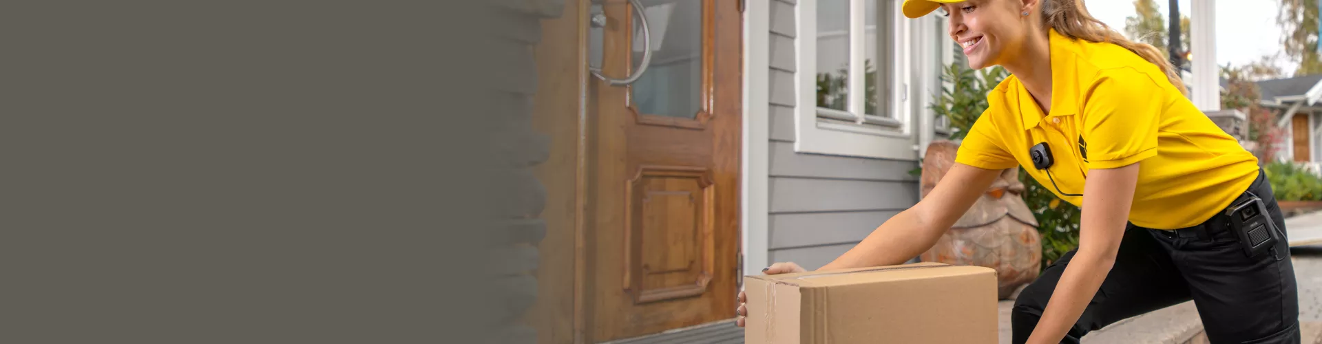 Delivery woman carrying package