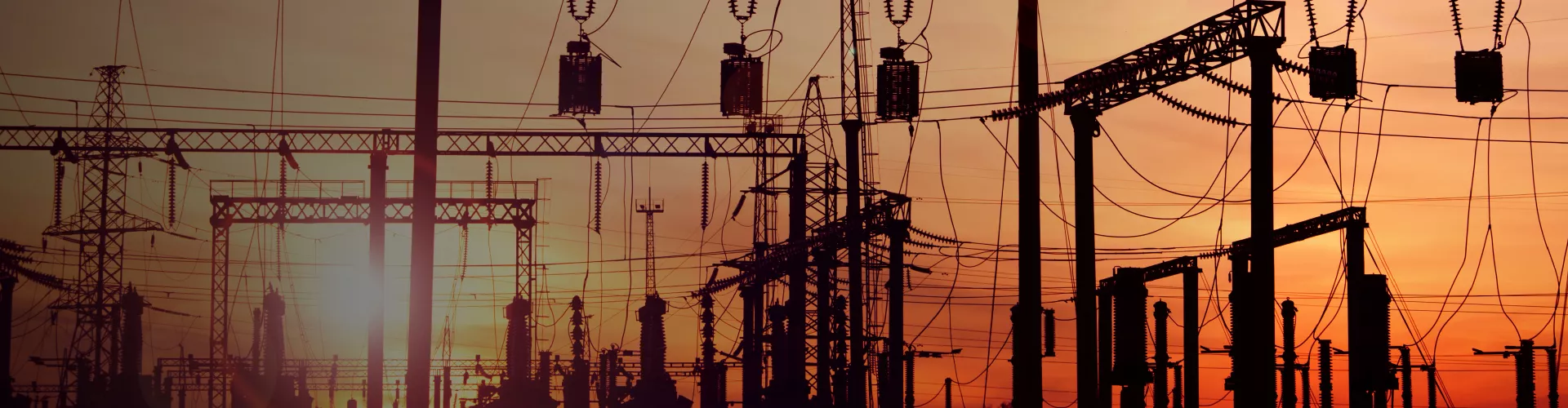 Electrical substation equipment in sunset