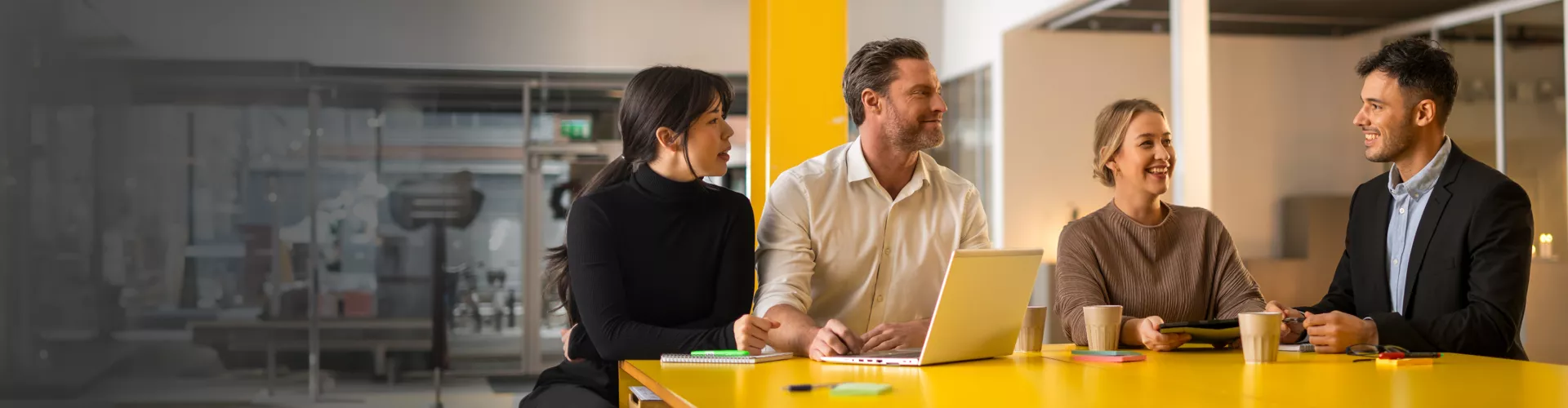 CPP group discussing by high desk