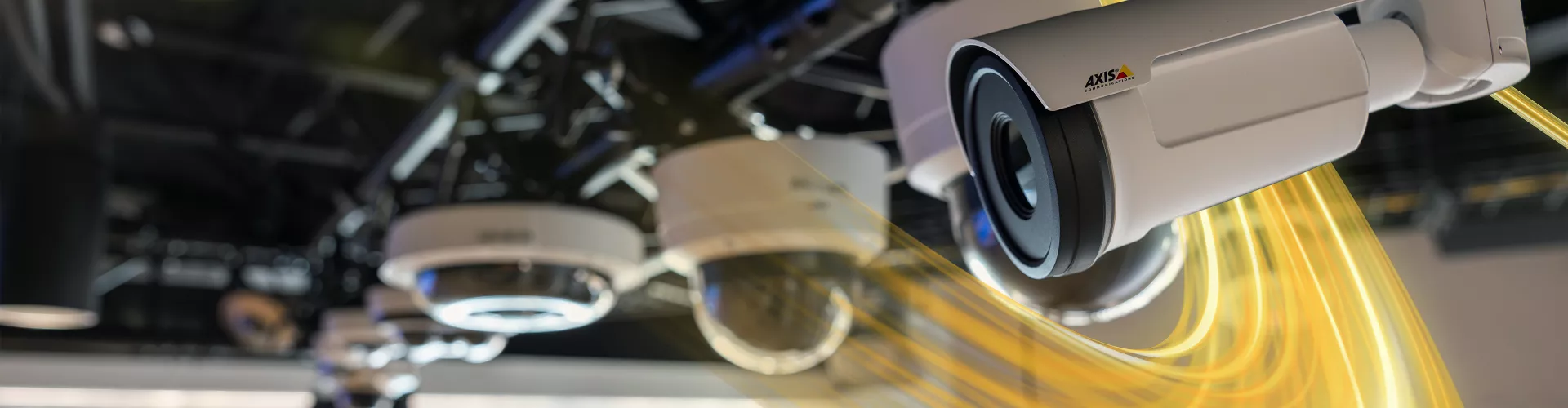 Axis cameras in a line with yellow light detailing