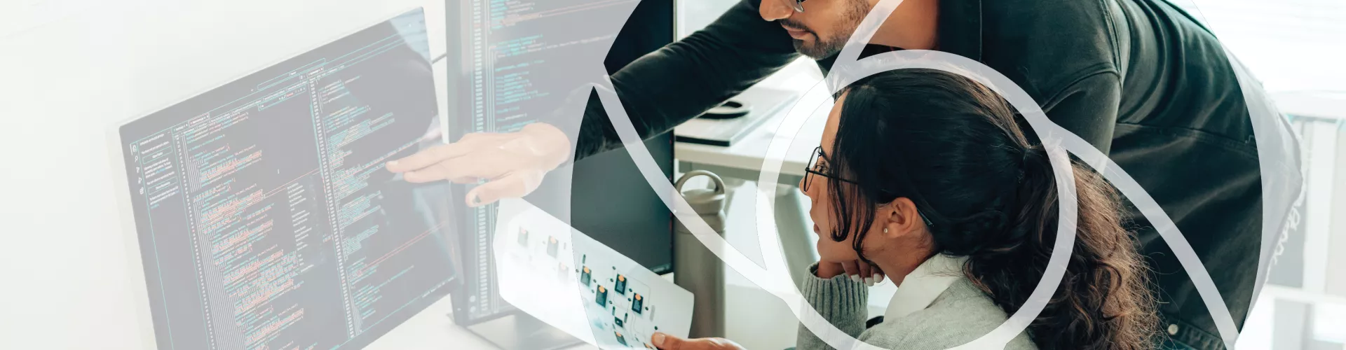 Man and women looking at computer 