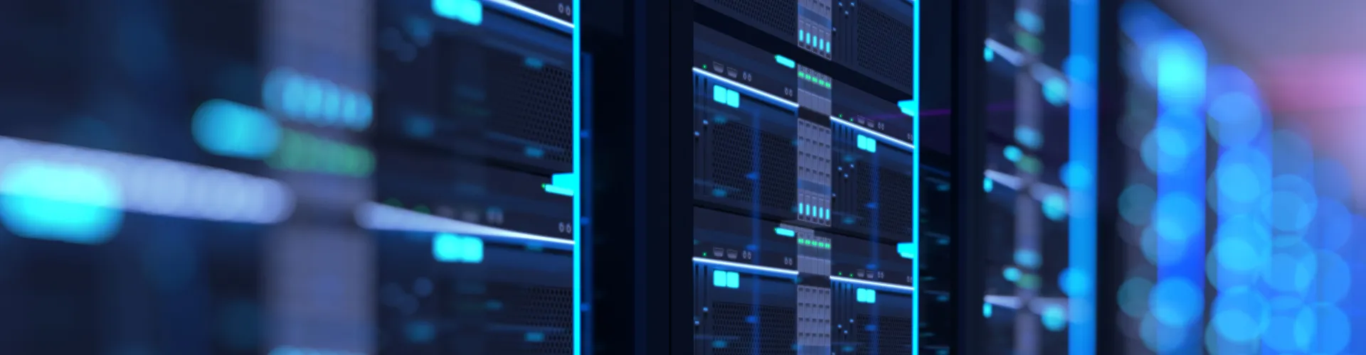 A close-up of a server room in a data center radiating blue lights.