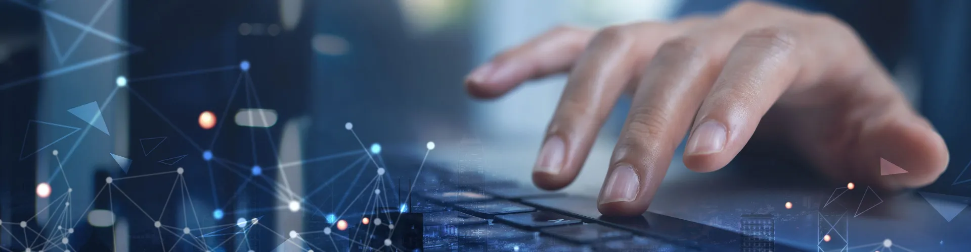 A hand on a laptop