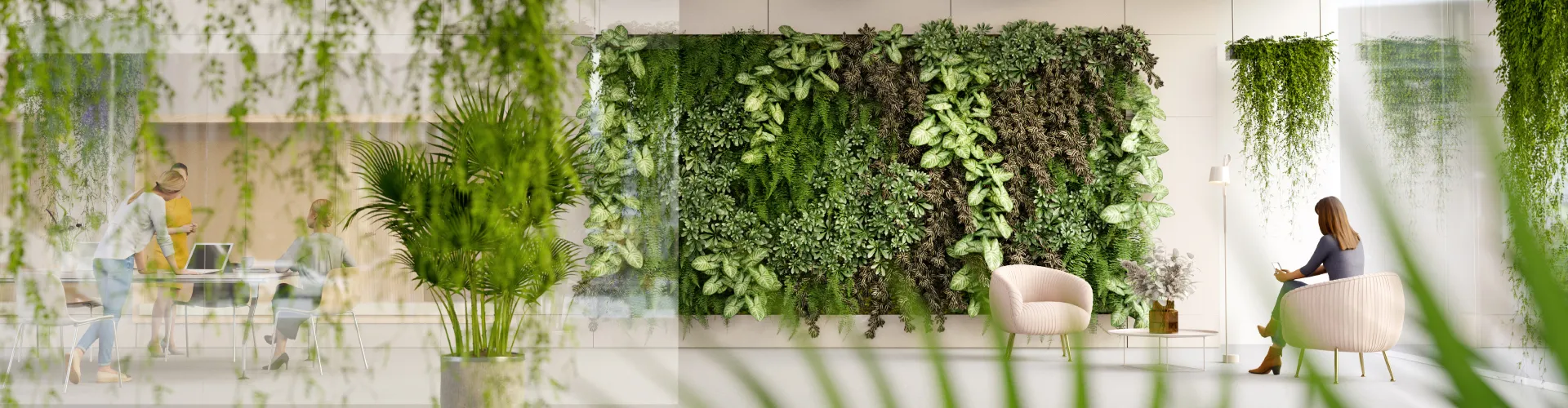 Open spaced lobby with a lot of greenery on the wall and the ceiling.