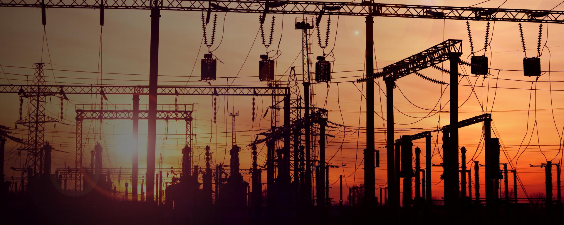 Electrical substation equipment in sunset