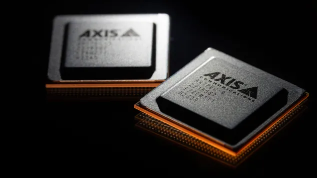 2 black smart chips with orange glow.