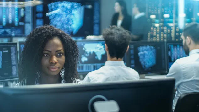 People on computers working.