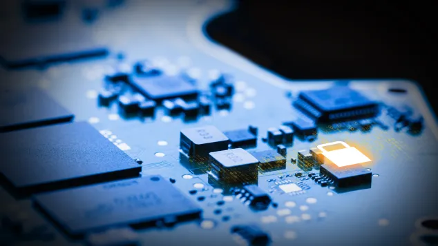 Cybersecurity chip with with a yellow lock element.