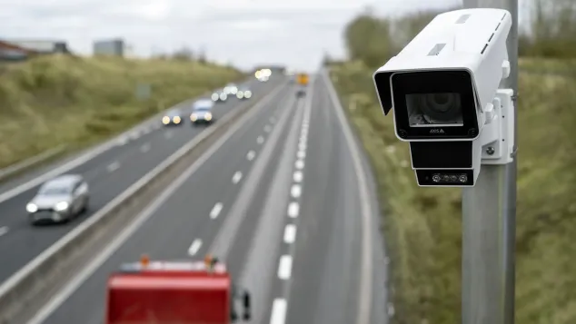 AXIS Q1686-DLE mounted on top of a highway to monitor traffic and hazardous vehicles.