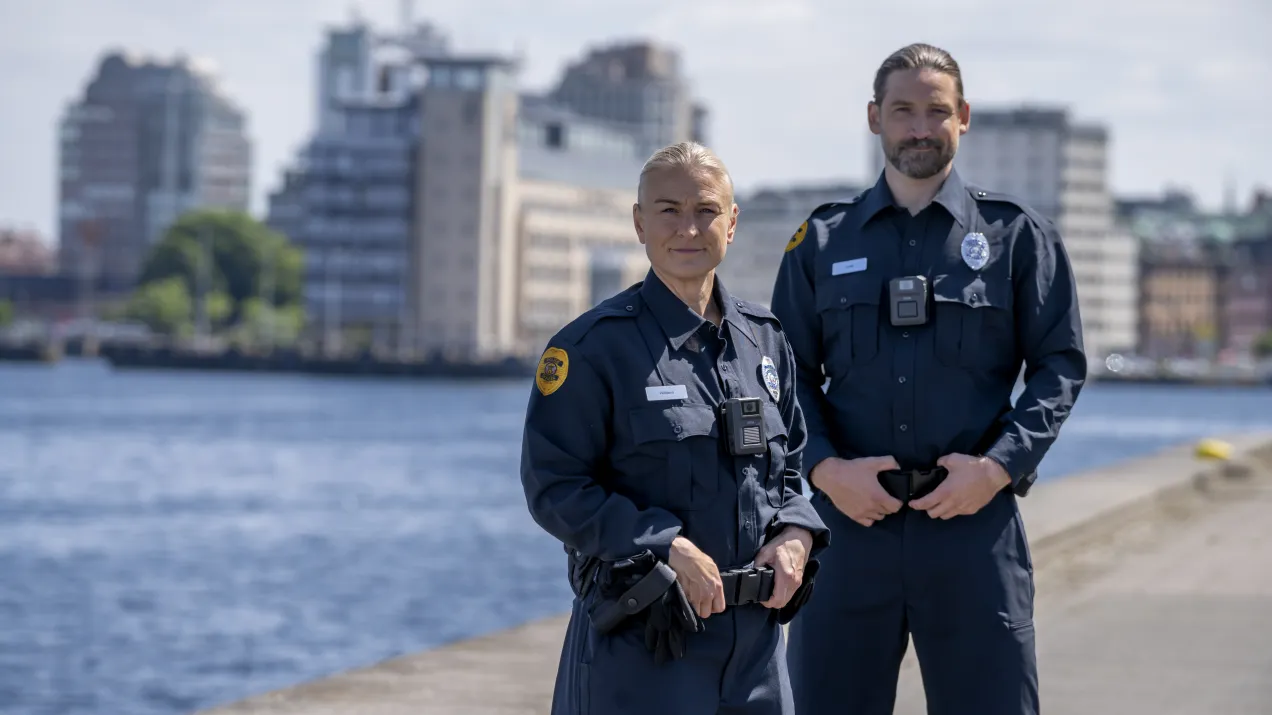 two police officers wearing body worn cameras 