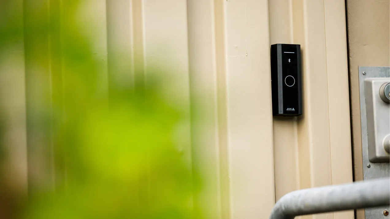 Access control key pad mounted on wall.