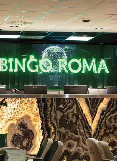 Bingo Roma room from the inside with big sign and seats in front.