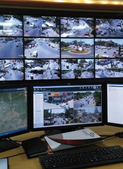 Monitors showing video footage from security cameras