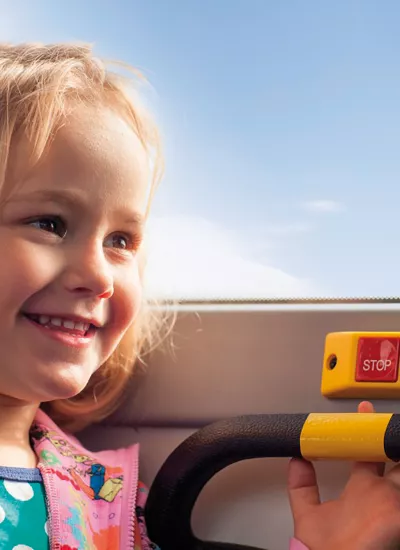 Happy child on bus