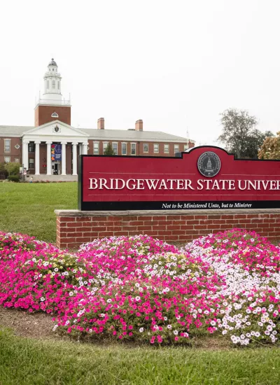 Beauty shot of Bridgewater State University's Boyden Hall with flowers
