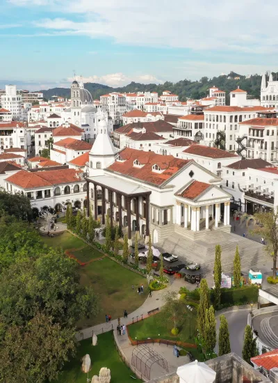 Aerial view of city with flag