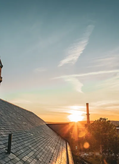 Aerial of Chicopee, MA at sunset with clock tower