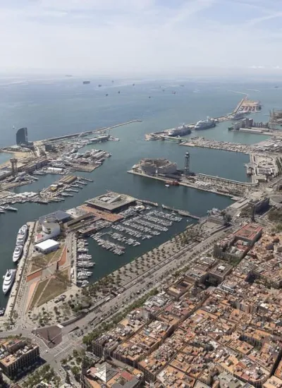 Aerial view of Barcelona's smart port and marina alongside the city skyline Edit media