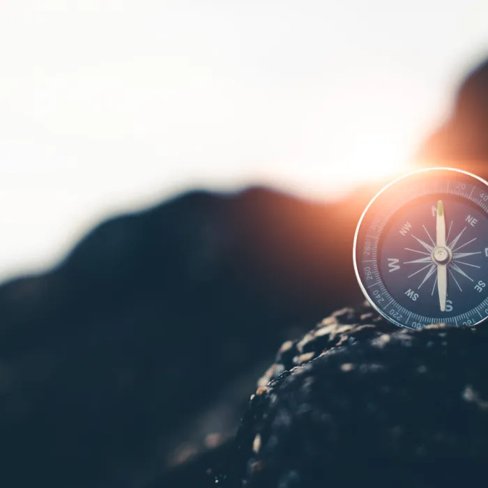 A compass pointing north.