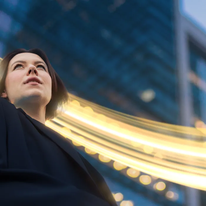 Woman in front of a building.