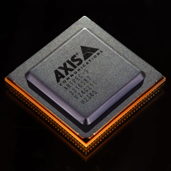 A black smart chip with orange light effect.