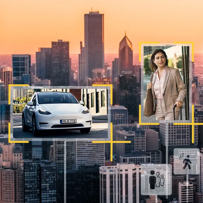 sunset over city and zoom in on a car and a woman using analytics tools.