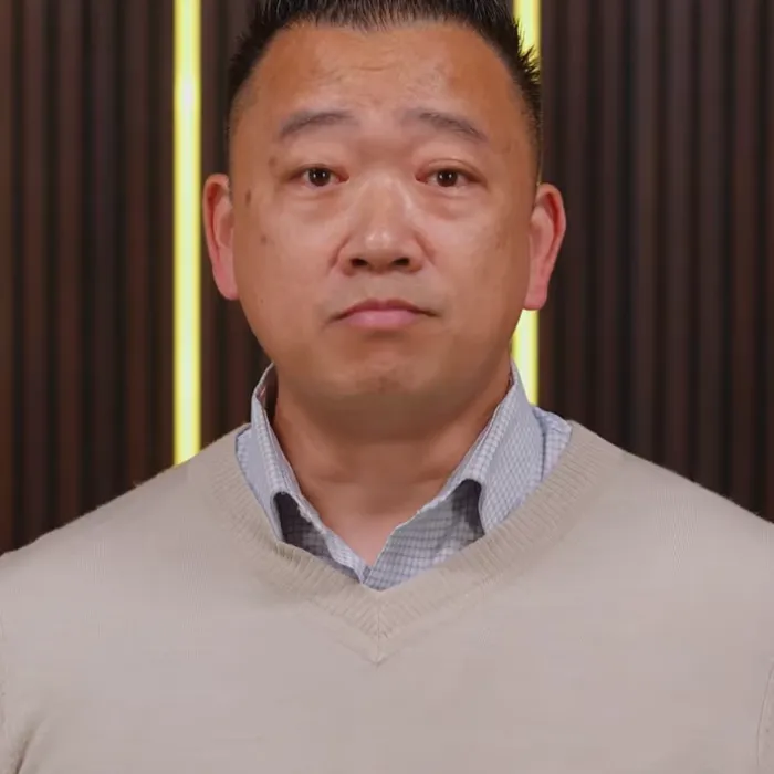 Close-up shot of Quang Trinh.