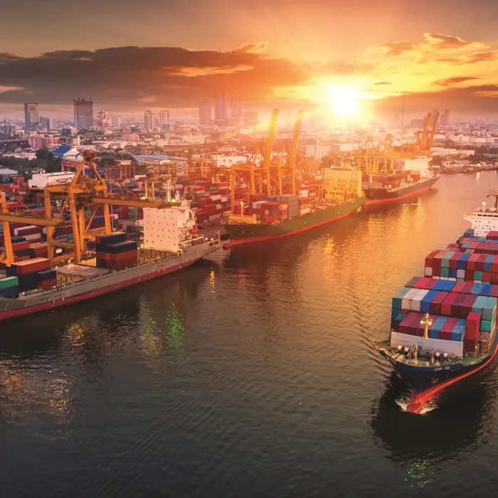 Containers ship entering a port.
