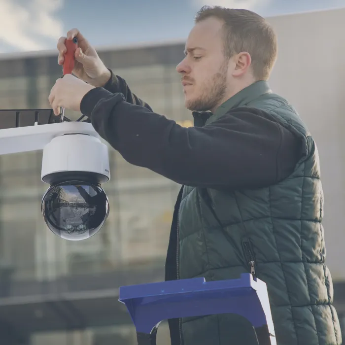 Man mounting a camera.