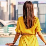 Woman looking out over a city