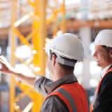 Two men wearing hard hats