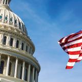 Capitol hill building with american flag