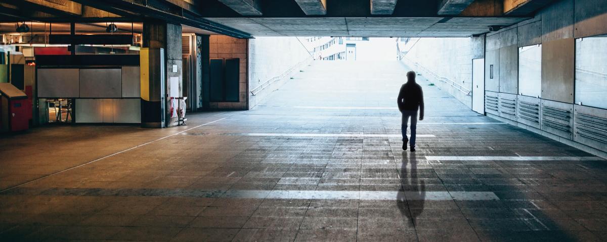 Man walking in a garage