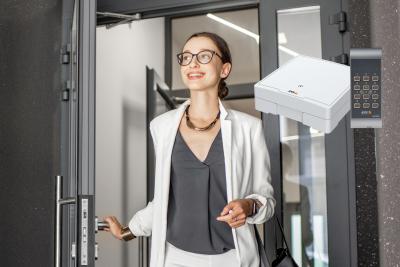 Access control, woman smiling, opening door