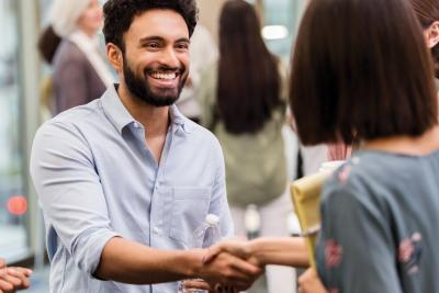 Man smiling, greeting